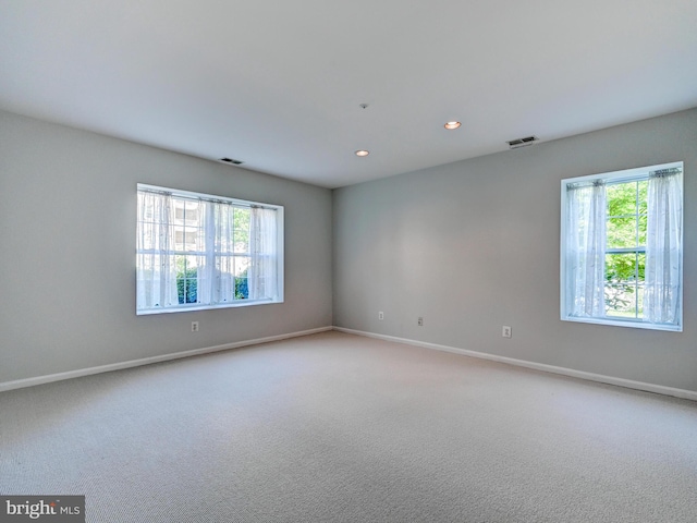 12111 Tullamore Ct Unit 101, Lutherville Timonium, MD 21093 - empty room featuring carpet floors, baseboards, and recessed lighting