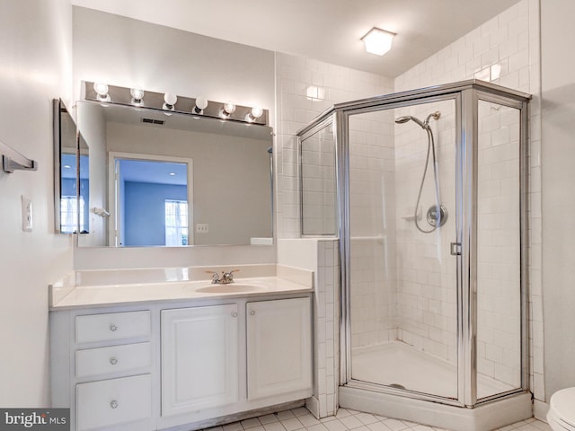 12111 Tullamore Ct Unit 101, Lutherville Timonium, MD 21093 - full bathroom featuring a stall shower, vanity, and tile patterned floors