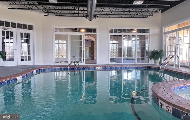 indoor pool with french doors