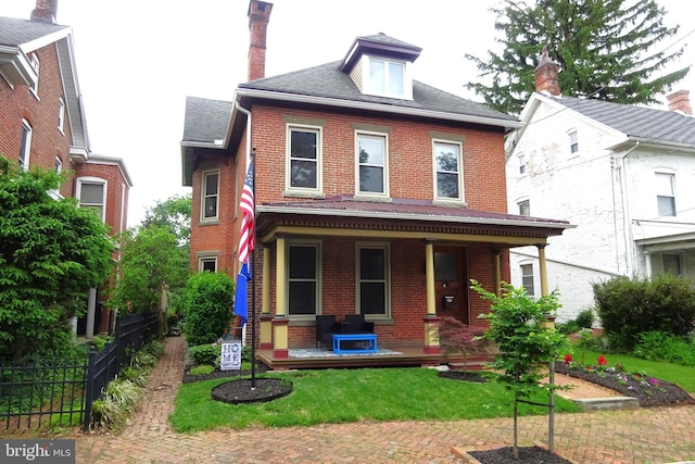 145 S Washington St, Greencastle, PA 17225 - traditional style home featuring brick siding and covered porch