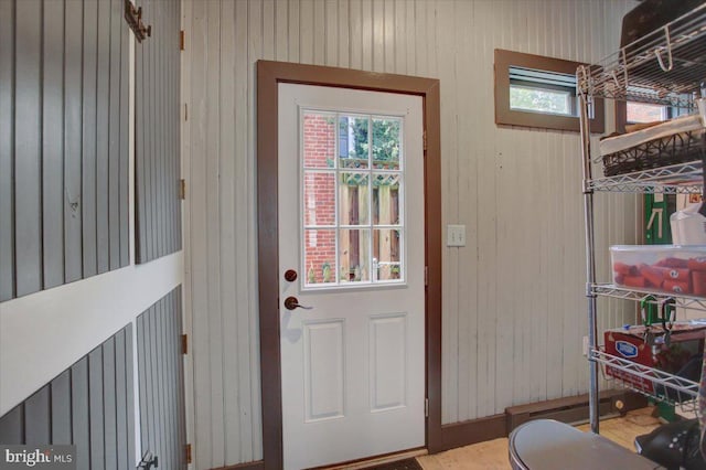 145 S Washington St, Greencastle, PA 17225 - entryway with wood walls and plenty of natural light