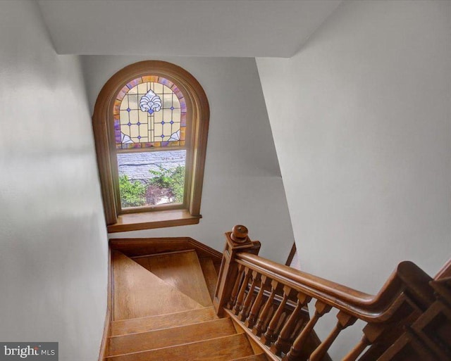 145 S Washington St, Greencastle, PA 17225 - stairway featuring plenty of natural light, wood finished floors, and arched walkways