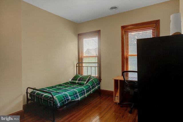 145 S Washington St, Greencastle, PA 17225 - bedroom featuring baseboards and wood finished floors