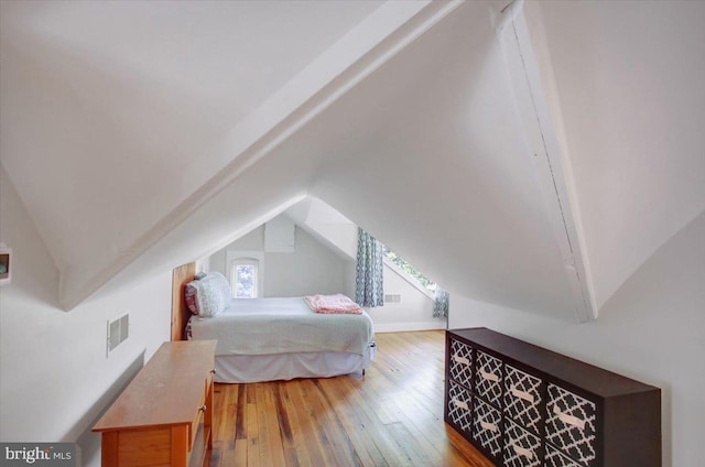 145 S Washington St, Greencastle, PA 17225 - bedroom with hardwood / wood-style flooring and lofted ceiling