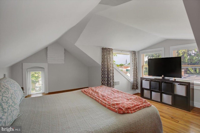 145 S Washington St, Greencastle, PA 17225 - bedroom featuring vaulted ceiling, light wood-style floors, and baseboards