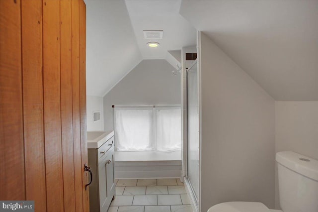 145 S Washington St, Greencastle, PA 17225 - bathroom with vaulted ceiling, toilet, a stall shower, and vanity