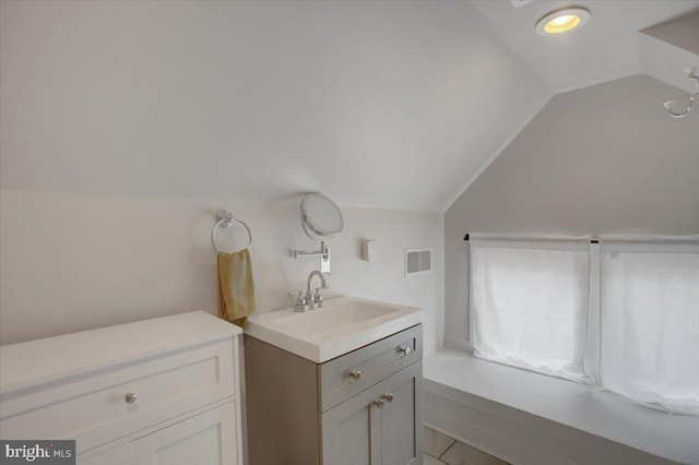 145 S Washington St, Greencastle, PA 17225 - bathroom featuring lofted ceiling and vanity