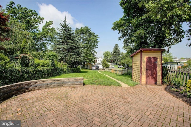 145 S Washington St, Greencastle, PA 17225 - view of patio / terrace featuring a shed and an outdoor structure