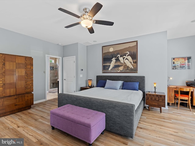 bedroom featuring light wood-style floors, ceiling fan, and baseboards