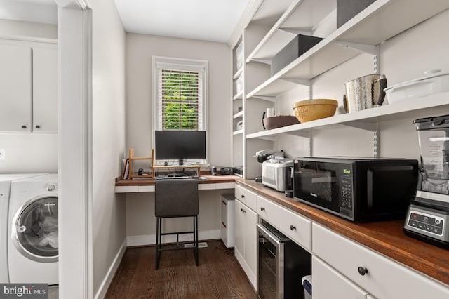 13312 Drews Ln, Potomac, MD 20854 - office featuring washer / clothes dryer, dark wood-type flooring, built in study area, and baseboards