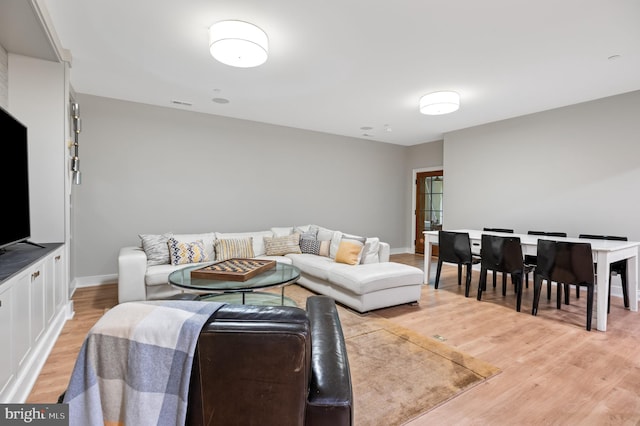 13312 Drews Ln, Potomac, MD 20854 - living area with light wood-type flooring and baseboards