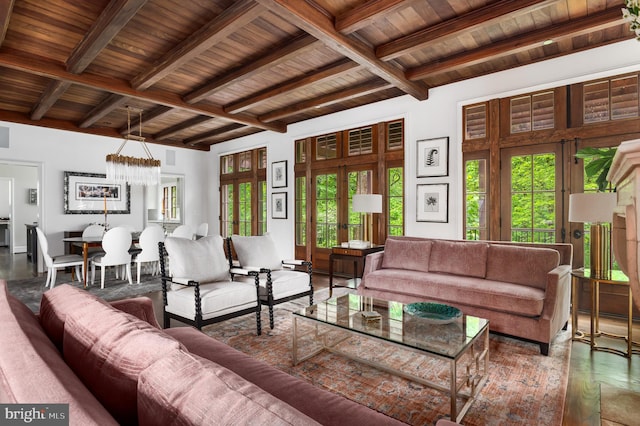 13312 Drews Ln, Potomac, MD 20854 - living room featuring wooden ceiling with exposed beams, wood finished floors, a chandelier, and baseboards