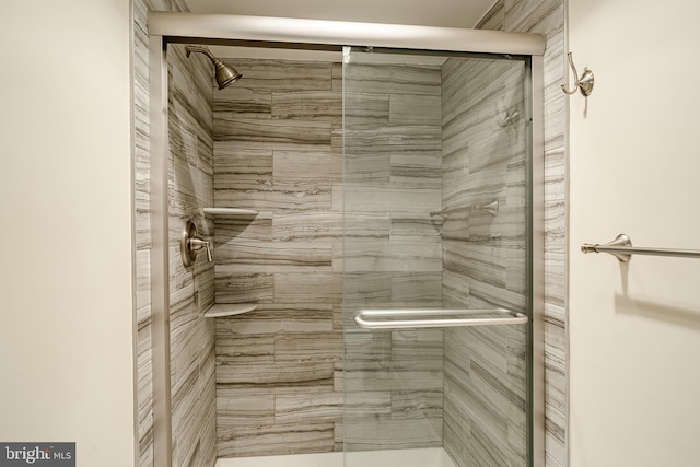 full bathroom featuring a stall shower