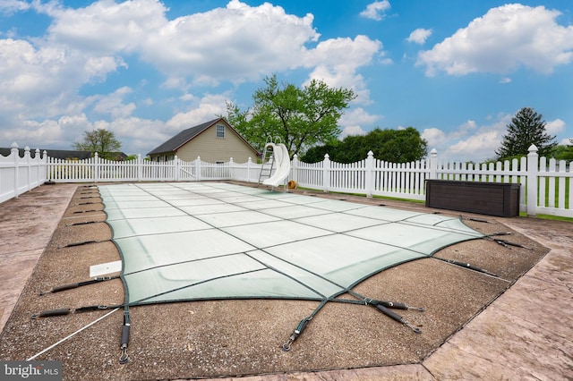 630 E Canal Rd, York, PA 17404 - view of pool featuring a water slide, a patio, and fence