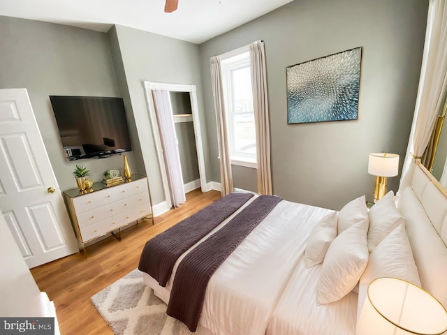 bedroom featuring light wood-style flooring