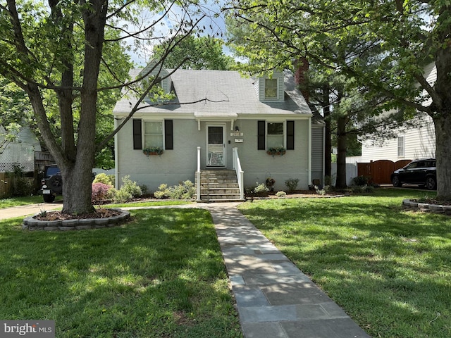 bungalow featuring a chimney and a shingled roof