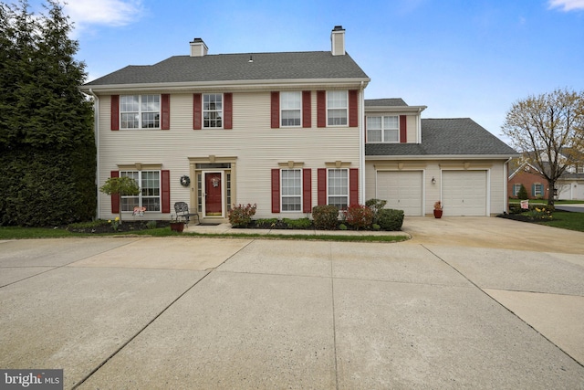 63 Grand Banks Cir, Marlton, NJ 08053 - colonial house featuring concrete driveway, a chimney, and a garage