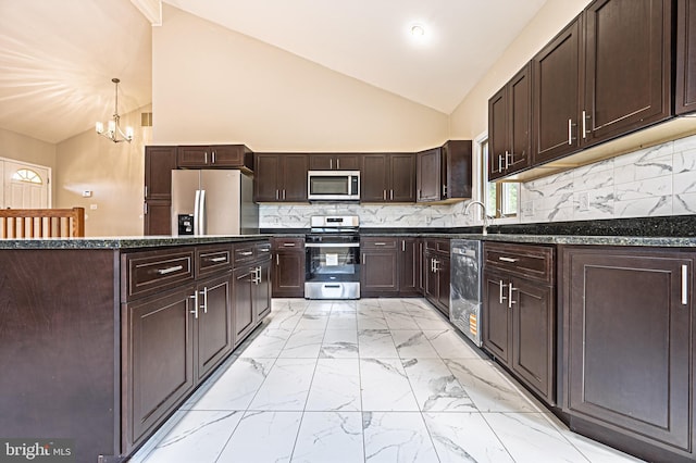 50 N Ave, Cedarville, NJ 08311 - kitchen featuring stainless steel appliances, vaulted ceiling, dark brown cabinetry, a chandelier, and light marble finish floors