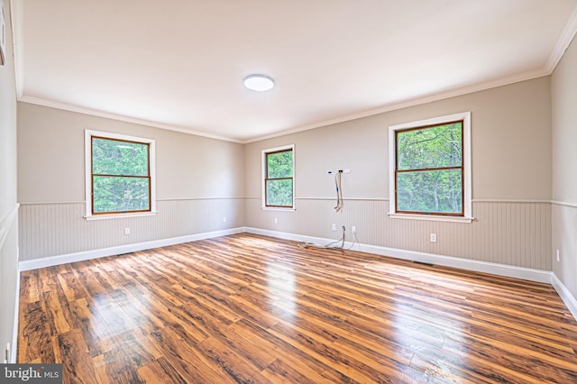 50 N Ave, Cedarville, NJ 08311 - empty room featuring wood-type flooring, wainscoting, and ornamental molding