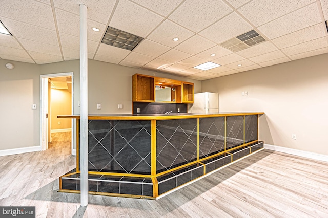 50 N Ave, Cedarville, NJ 08311 - bar area featuring freestanding refrigerator, wood finished floors, baseboards, a paneled ceiling, and recessed lighting