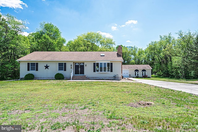 50 N Ave, Cedarville, NJ 08311 - ranch-style home featuring a chimney, entry steps, a front lawn, and driveway
