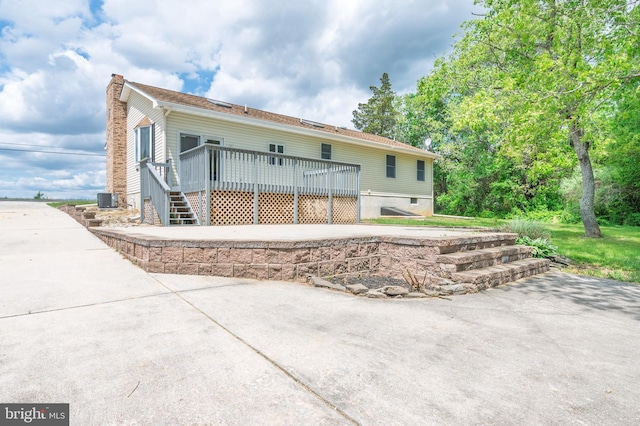50 N Ave, Cedarville, NJ 08311 - back of house featuring a chimney, central AC, and a deck