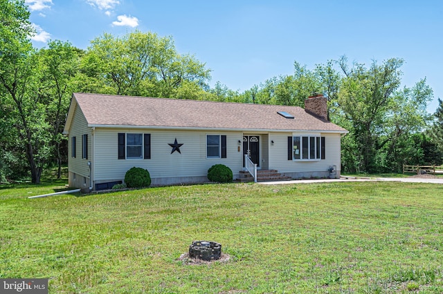 50 N Ave, Cedarville, NJ 08311 - ranch-style home with entry steps, a chimney, an outdoor fire pit, and a front lawn