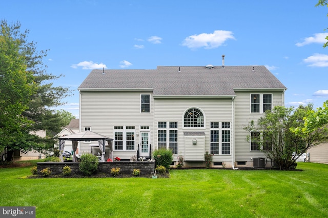 27 Avalon Rd, Pennington, NJ 08534 - back of property featuring a gazebo, a lawn, central air condition unit, and roof with shingles