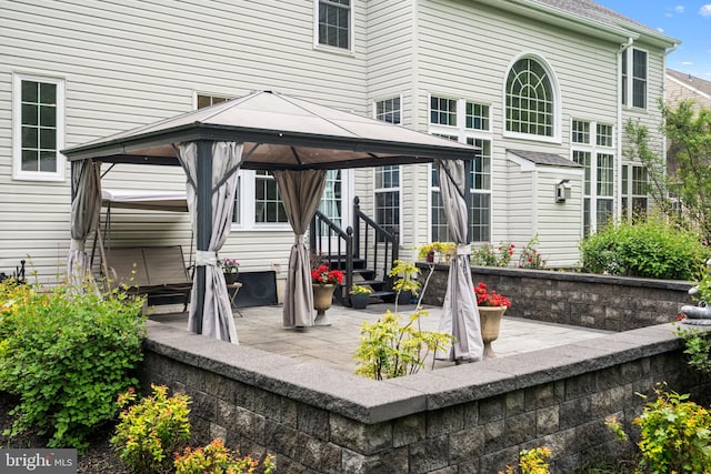 27 Avalon Rd, Pennington, NJ 08534 - back of property featuring a gazebo and a patio area