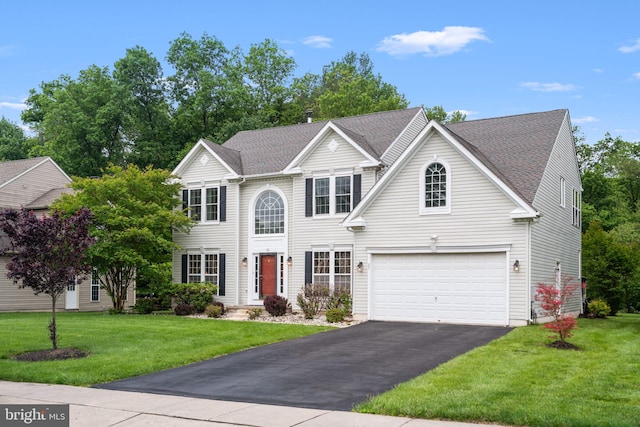 27 Avalon Rd, Pennington, NJ 08534 - view of front of home with asphalt driveway, an attached garage, and a front yard