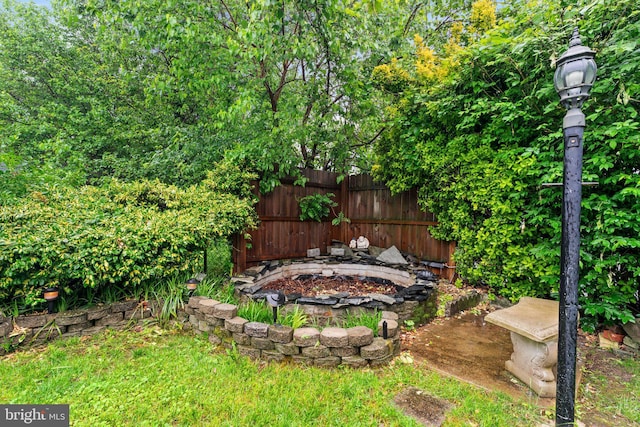 1517 Margaret St, Woodbridge, VA 22191 - view of yard with a fire pit and fence