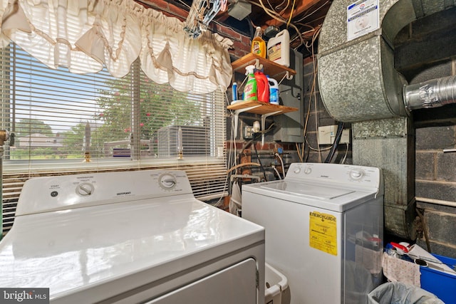 1517 Margaret St, Woodbridge, VA 22191 - clothes washing area with washing machine and clothes dryer and plenty of natural light