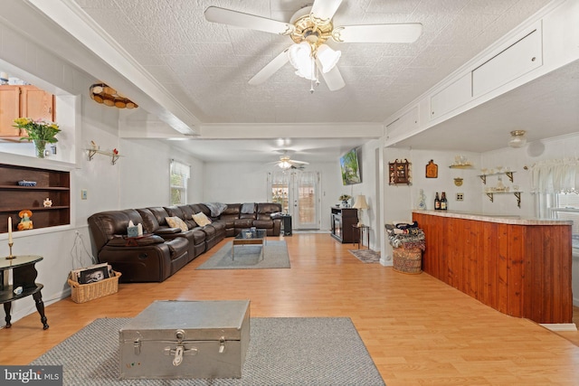 1517 Margaret St, Woodbridge, VA 22191 - living area with a ceiling fan, wood finished floors, and crown molding