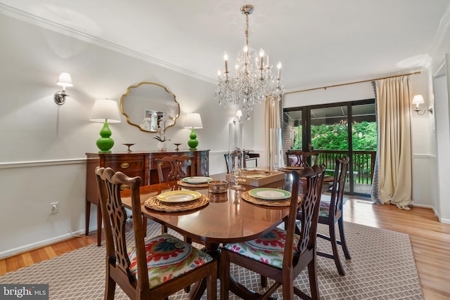 16 Lacosta Ct, Towson, MD 21204 - dining area featuring a chandelier, crown molding, light wood-style floors, and baseboards