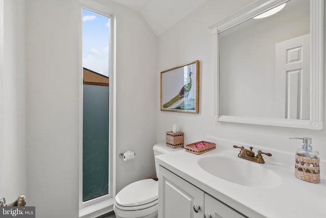 16 Lacosta Ct, Towson, MD 21204 - bathroom featuring toilet, vanity, and vaulted ceiling