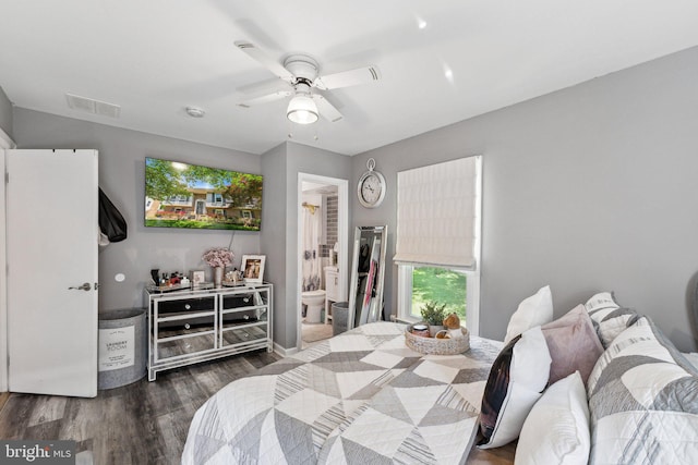 12906 7th St, Bowie, MD 20720 - bedroom with wood finished floors, ensuite bathroom, ceiling fan, and baseboards