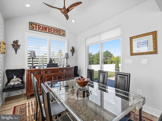 dining area with ceiling fan, vaulted ceiling, light wood-type flooring, recessed lighting, and baseboards