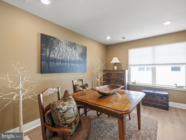 home office featuring wood finished floors, baseboards, and recessed lighting