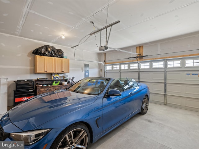 garage featuring a garage door opener