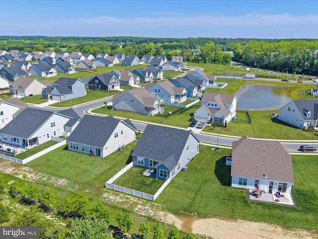 aerial perspective of suburban area featuring a large body of water