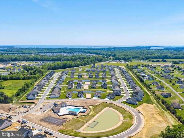 aerial view of residential area featuring a pool