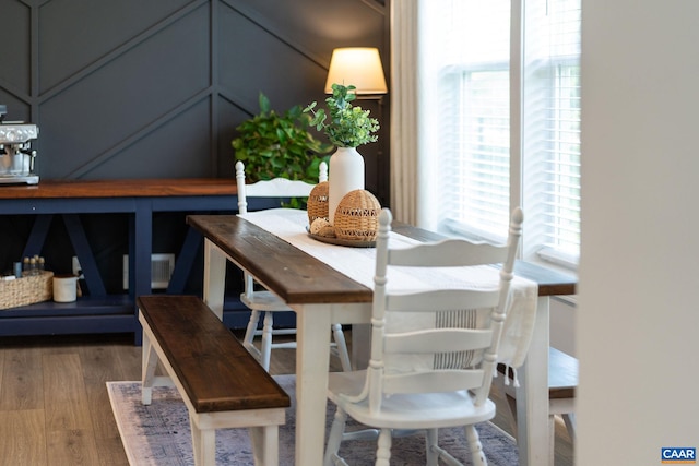 dining room with wood finished floors