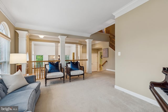 229 Bowen Ct, Annapolis, MD 21401 - living room with crown molding, ornate columns, light colored carpet, and baseboards