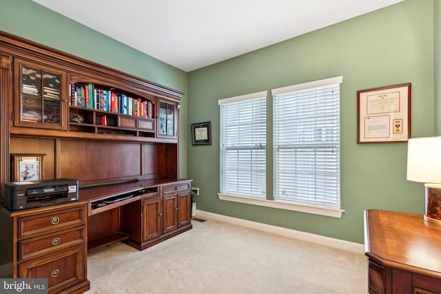 229 Bowen Ct, Annapolis, MD 21401 - office area featuring light colored carpet, baseboards, and built in desk