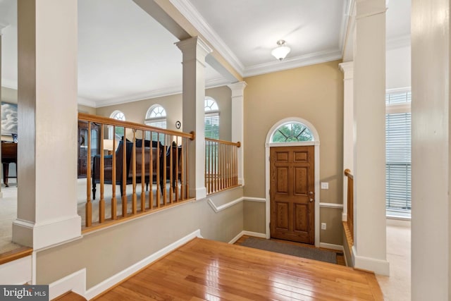 229 Bowen Ct, Annapolis, MD 21401 - entrance foyer featuring decorative columns, ornamental molding, baseboards, and wood finished floors