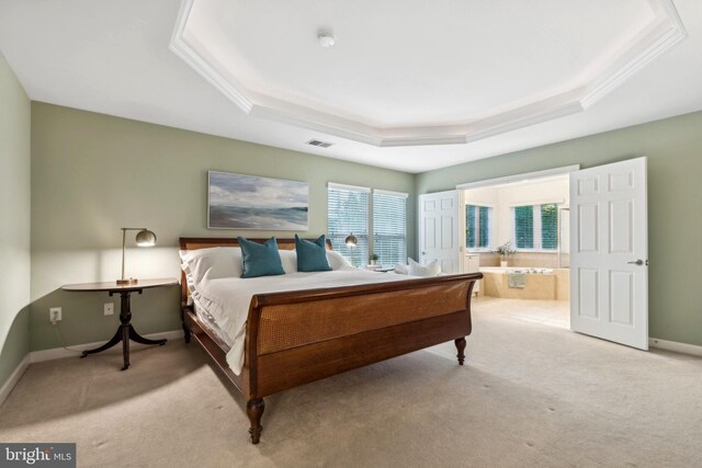 229 Bowen Ct, Annapolis, MD 21401 - bedroom with a tray ceiling, carpet, connected bathroom, ornamental molding, and baseboards
