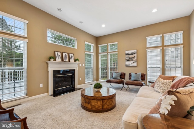 229 Bowen Ct, Annapolis, MD 21401 - living area with carpet, recessed lighting, a fireplace with flush hearth, and baseboards