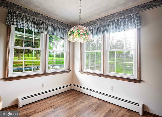 3019 Level Rd, Churchville, MD 21028 - unfurnished dining area featuring wood finished floors and a baseboard radiator