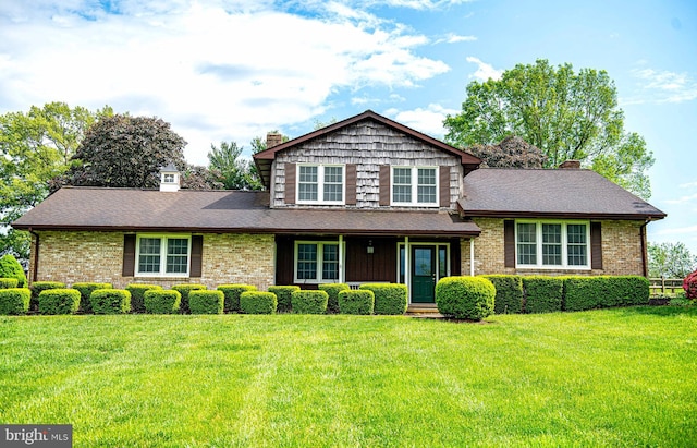3019 Level Rd, Churchville, MD 21028 - split level home with a chimney, a front lawn, brick siding, and roof with shingles