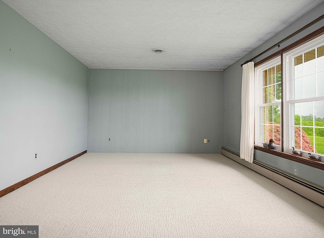 3019 Level Rd, Churchville, MD 21028 - unfurnished room featuring baseboard heating, carpet floors, and a textured ceiling